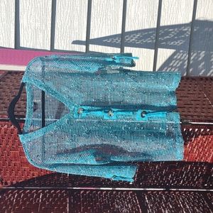 Very cute summer crotchet cover in turquoise. Size m. Made by kaktus. Never worn